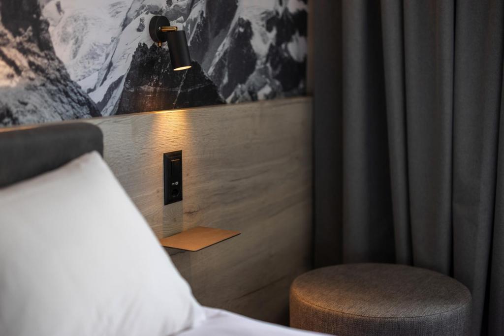 Postel nebo postele na pokoji v ubytování Zleep Hotel Lausanne-Chavannes