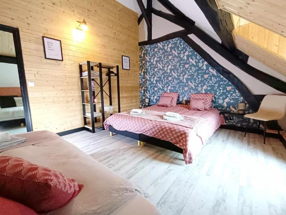 Postel nebo postele na pokoji v ubytování Gîte à côté