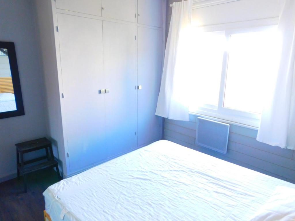 Posteľ alebo postele v izbe v ubytovaní GMID IMMO Apartamento Mas Oliva