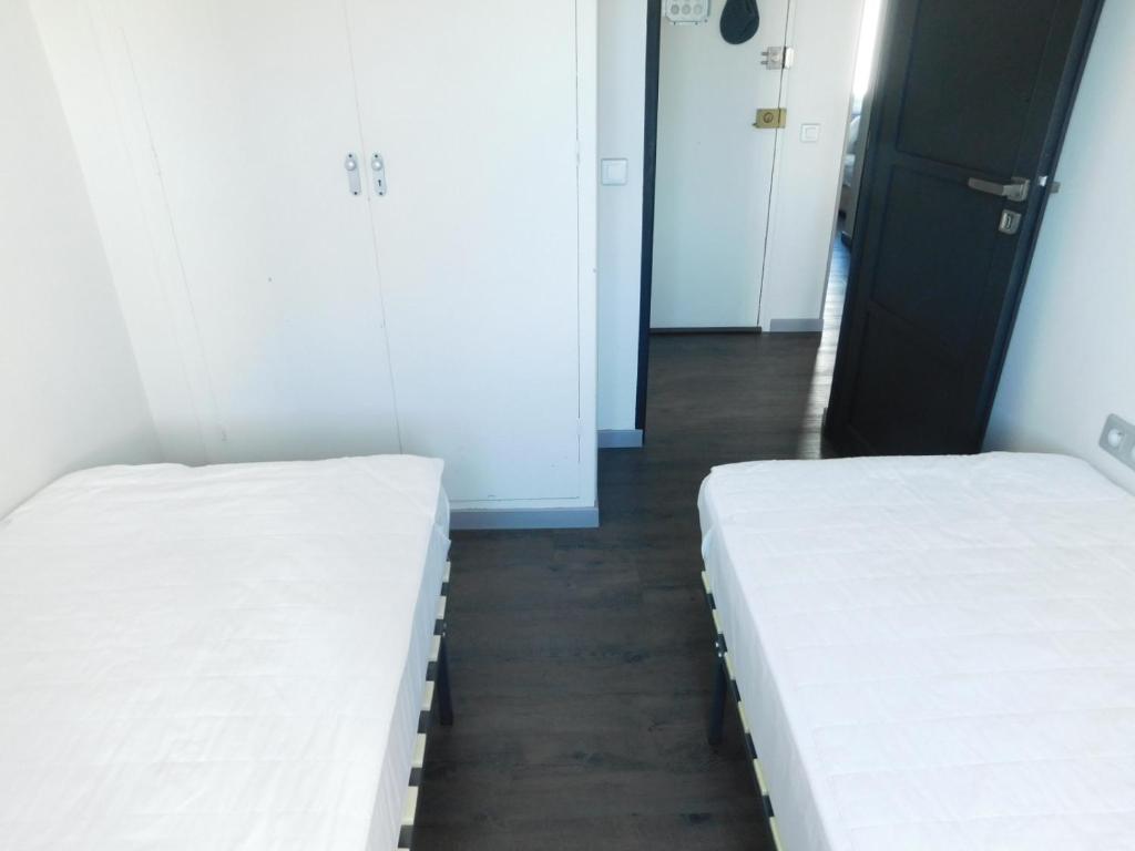 Posteľ alebo postele v izbe v ubytovaní GMID IMMO Apartamento Mas Oliva