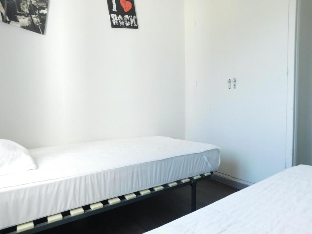 Posteľ alebo postele v izbe v ubytovaní GMID IMMO Apartamento Mas Oliva