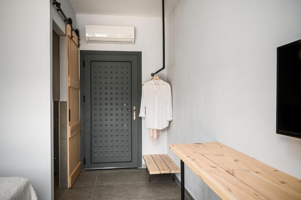 Postel nebo postele na pokoji v ubytování Gefiri Plakas Hotel, Tzoumerka