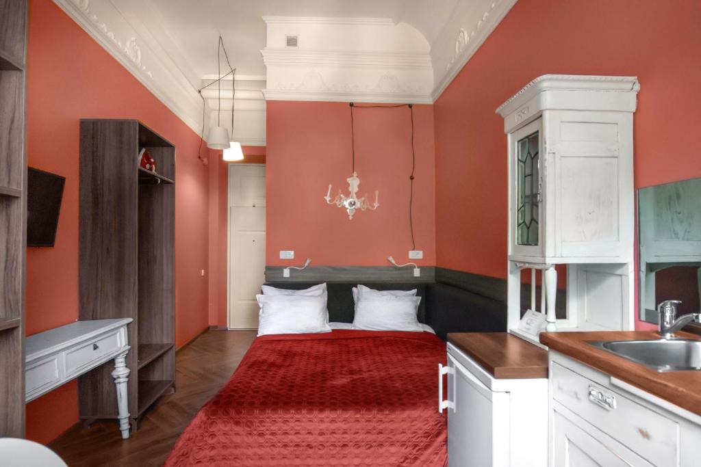 Postel nebo postele na pokoji v ubytování Apart Hotel Michelle