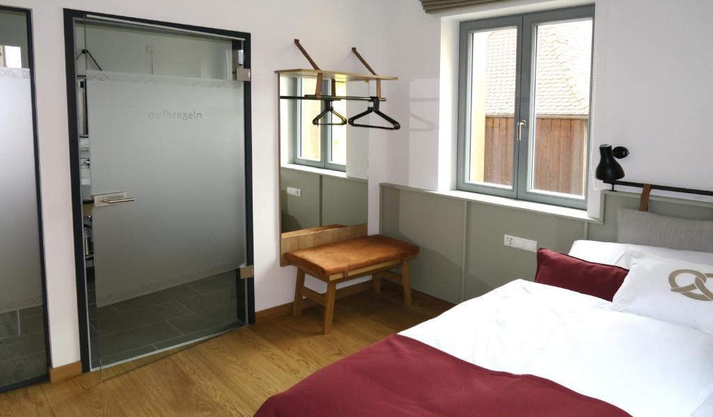 Postel nebo postele na pokoji v ubytování Gästehaus Gräf Haus
