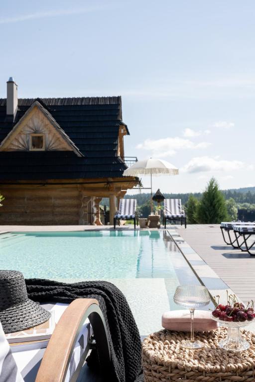 Bazén v ubytování Domki w Białce WOODHOUSE- basen, sauna, jacuzzi nebo v jeho okolí