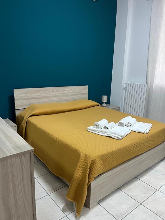 Łóżko lub łóżka w pokoju w obiekcie Joya apartament