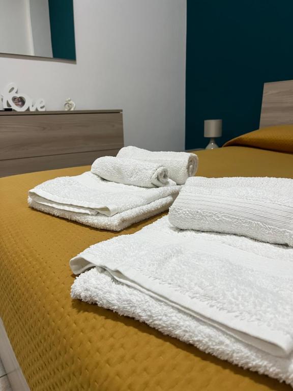 Łóżko lub łóżka w pokoju w obiekcie Joya apartament
