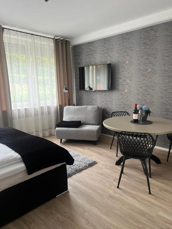 Posezení v ubytování Alpha Rooms