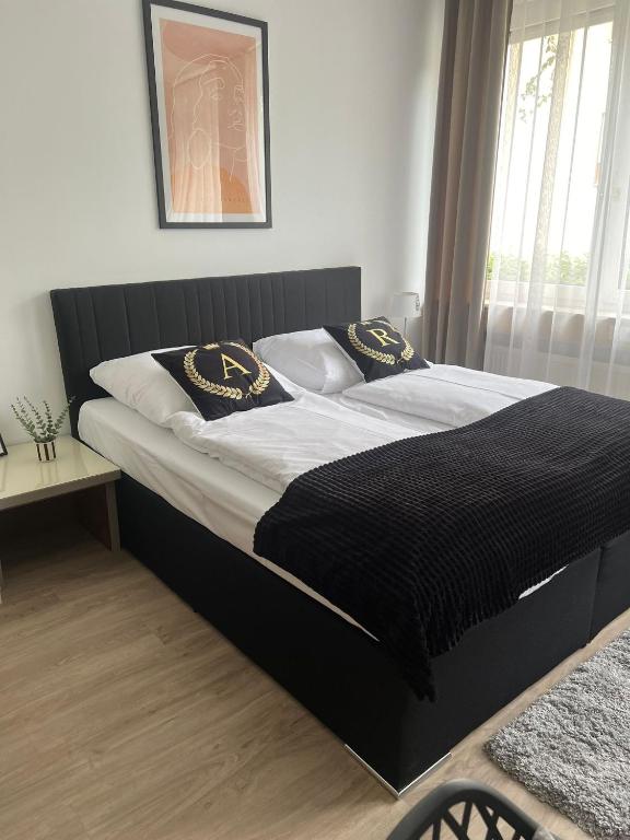 Postel nebo postele na pokoji v ubytování Alpha Rooms
