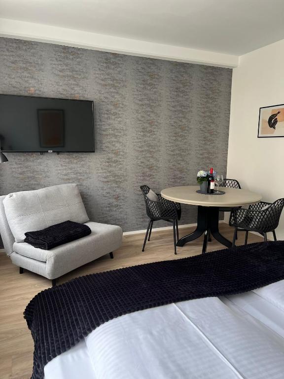 Posezení v ubytování Alpha Rooms