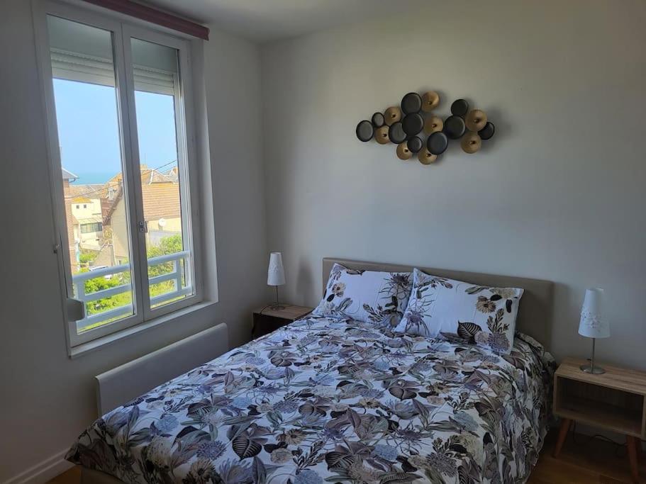Postel nebo postele na pokoji v ubytování Appartement vue mer à 100 m de la plage