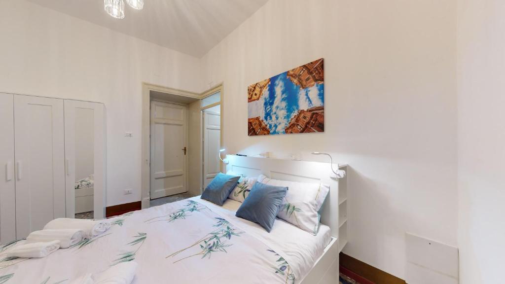 Letto o letti in una camera di Ai Crociferi affittacamere