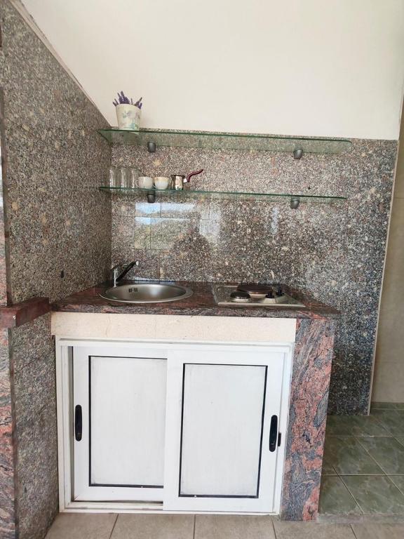 Kuchyň nebo kuchyňský kout v ubytování Apartments Lucerna