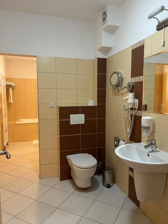 Koupelna v ubytování Hotel Legend