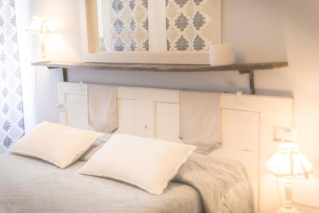 Postel nebo postele na pokoji v ubytování B&B Il Fosso Bianco