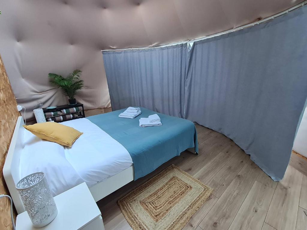 Postel nebo postele na pokoji v ubytování Glamping Cañon del Rio Lobos
