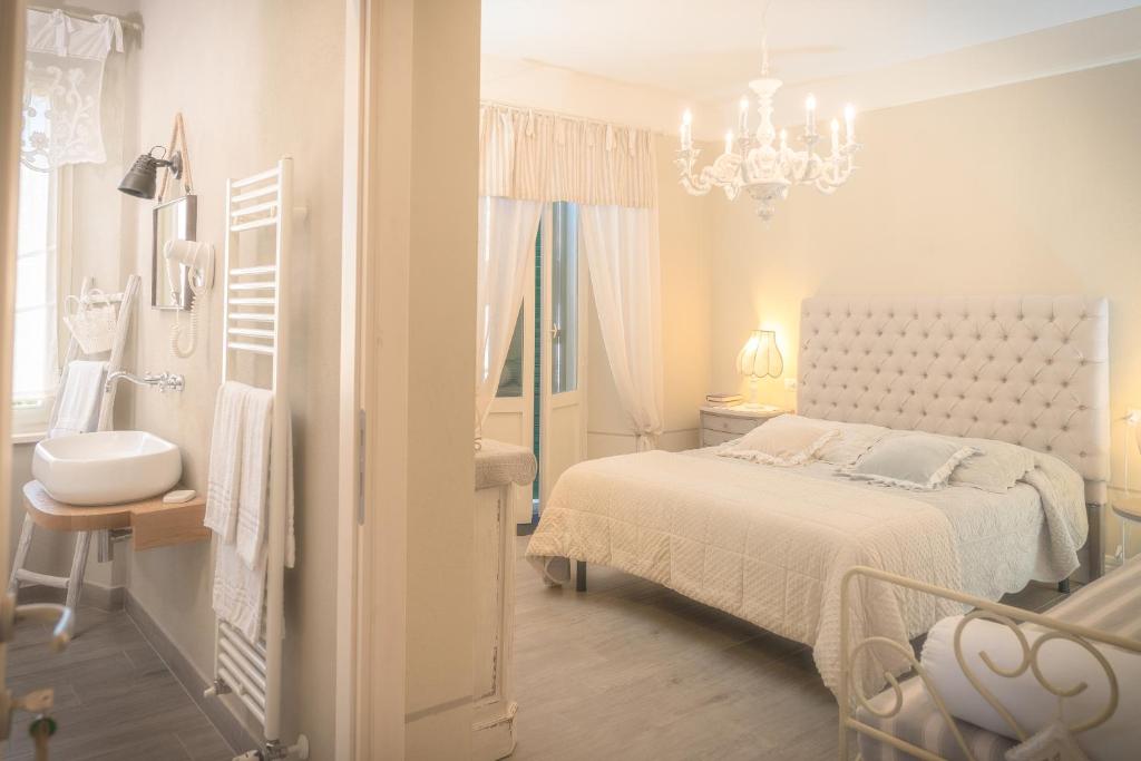 Postel nebo postele na pokoji v ubytování B&B Il Fosso Bianco