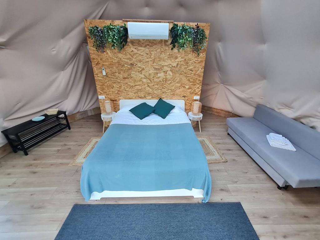 Postel nebo postele na pokoji v ubytování Glamping Cañon del Rio Lobos