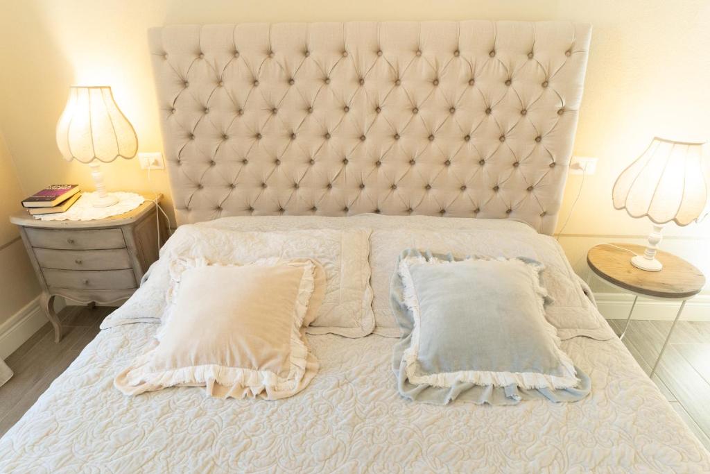 Postel nebo postele na pokoji v ubytování B&B Il Fosso Bianco