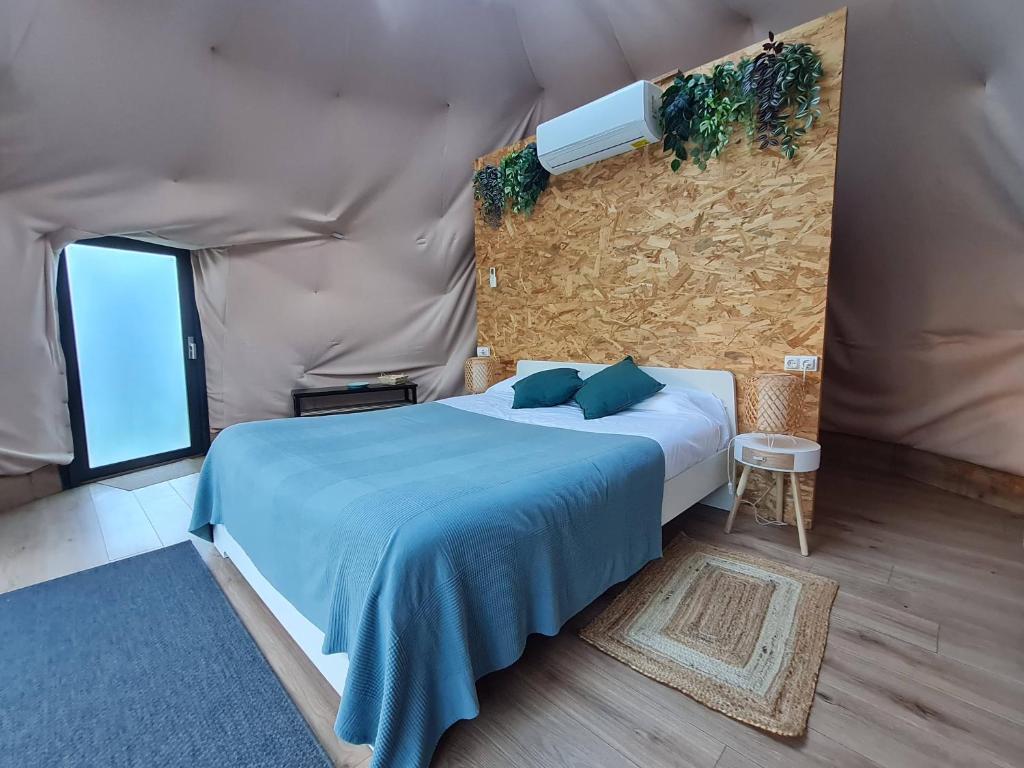 Postel nebo postele na pokoji v ubytování Glamping Cañon del Rio Lobos