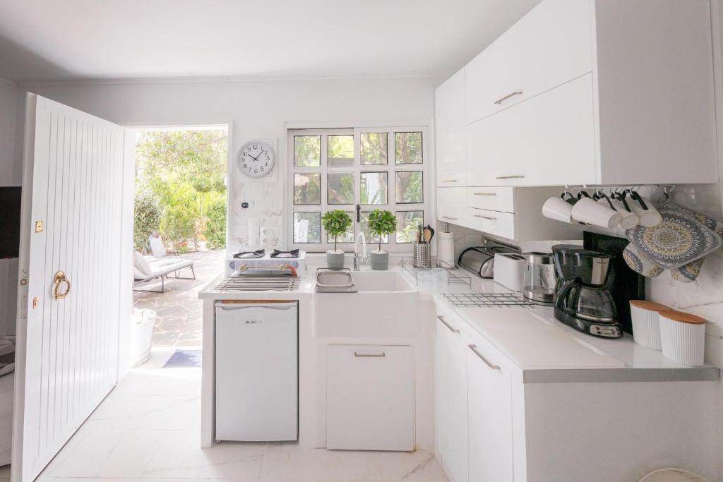Kuchyň nebo kuchyňský kout v ubytování Gardenhouse