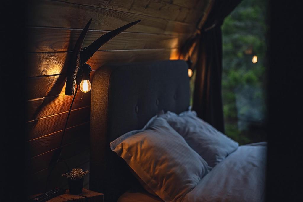 Postel nebo postele na pokoji v ubytování Black Chalet