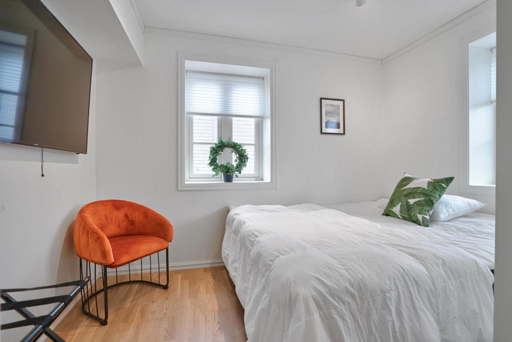 En eller flere senge i et værelse på TotalApartments Skansegata Studio Apartments