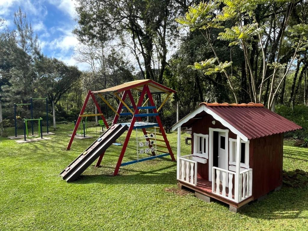 A área de jogos para crianças em Pousada Rosa