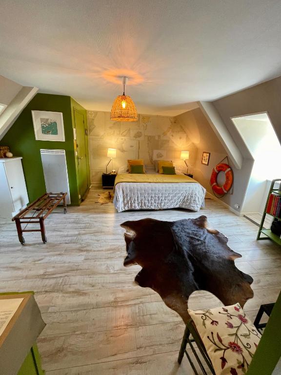 Postel nebo postele na pokoji v ubytování Chambres De St Michel