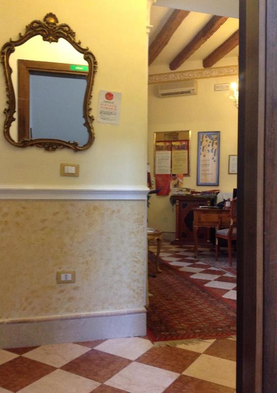 TV a/nebo společenská místnost v ubytování Casa Alla Fenice