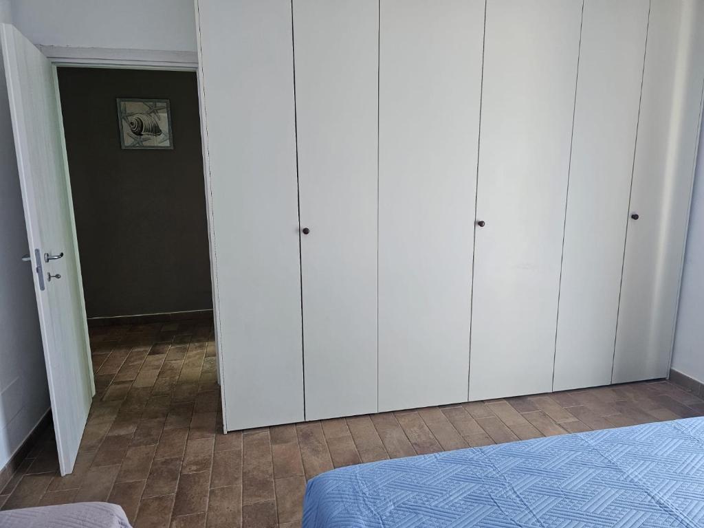 Postel nebo postele na pokoji v ubytování Appartamento Azzurro Mare