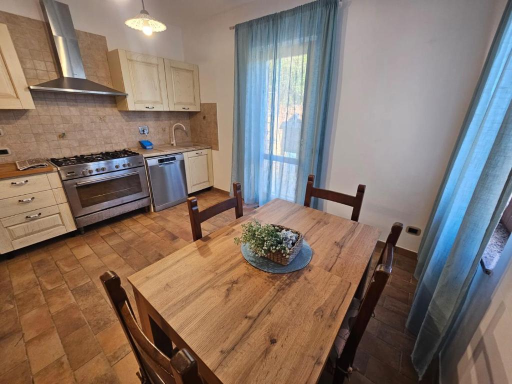 Kuchyň nebo kuchyňský kout v ubytování Appartamento Azzurro Mare