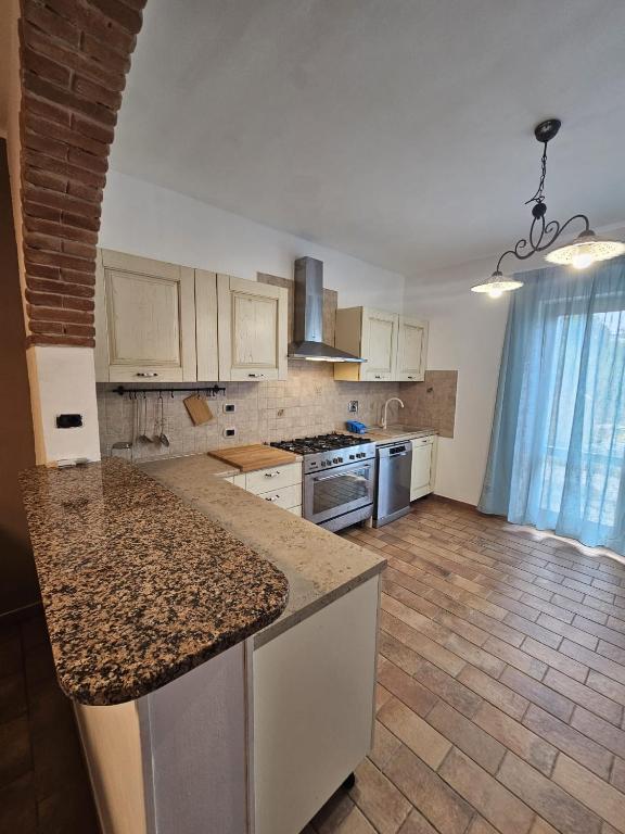 Kuchyň nebo kuchyňský kout v ubytování Appartamento Azzurro Mare