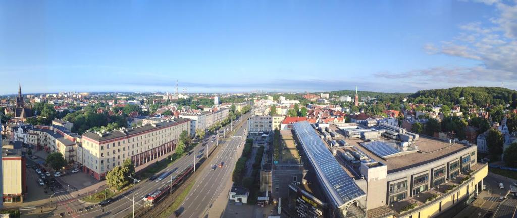 an overhead view of a city with buildings and a street at Kawalerka Gdańsk Wrzeszcz in Gdańsk