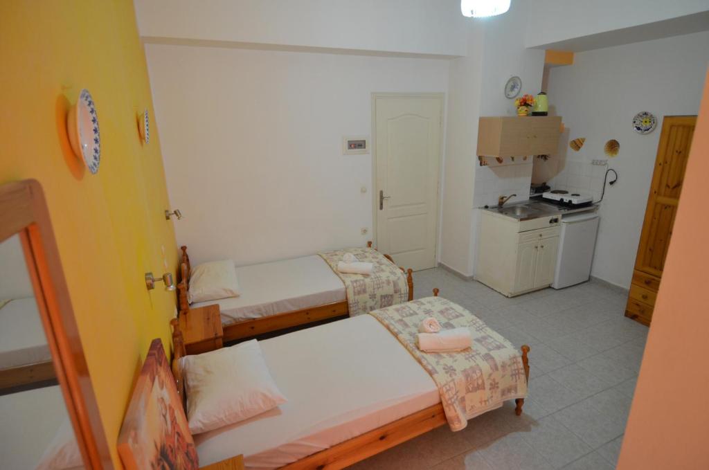 Postel nebo postele na pokoji v ubytování Marianthi