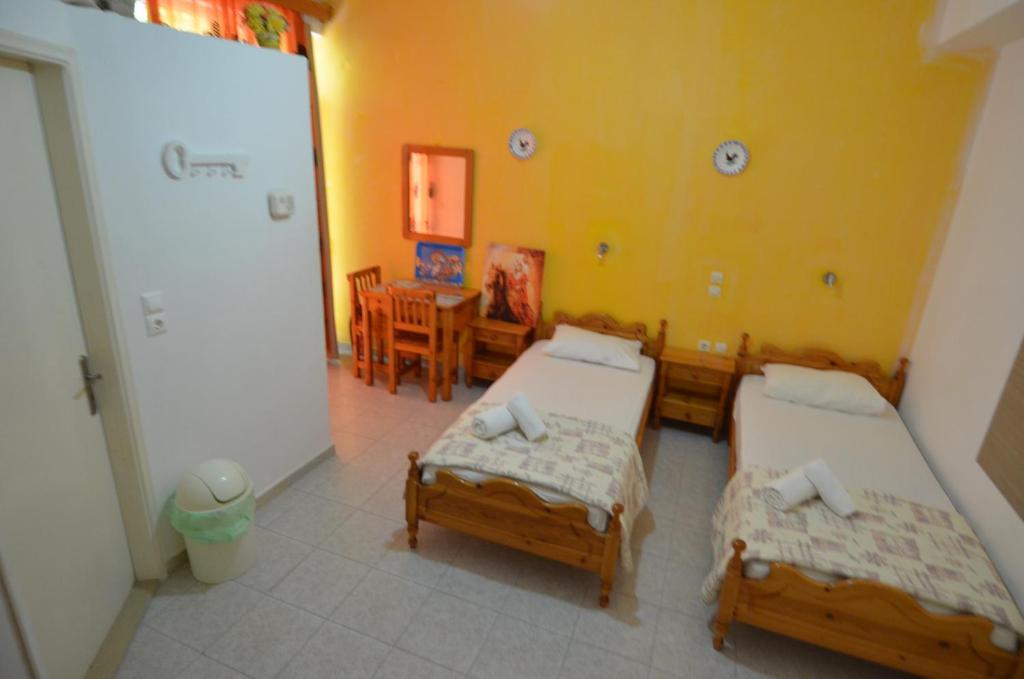 Postel nebo postele na pokoji v ubytování Marianthi