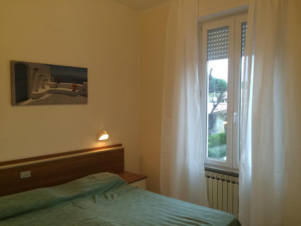Postel nebo postele na pokoji v ubytování Hotel Mirage