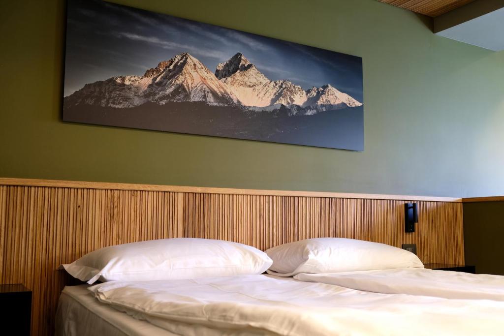 Posteľ alebo postele v izbe v ubytovaní Sui Generis - Aosta Urban Apartments