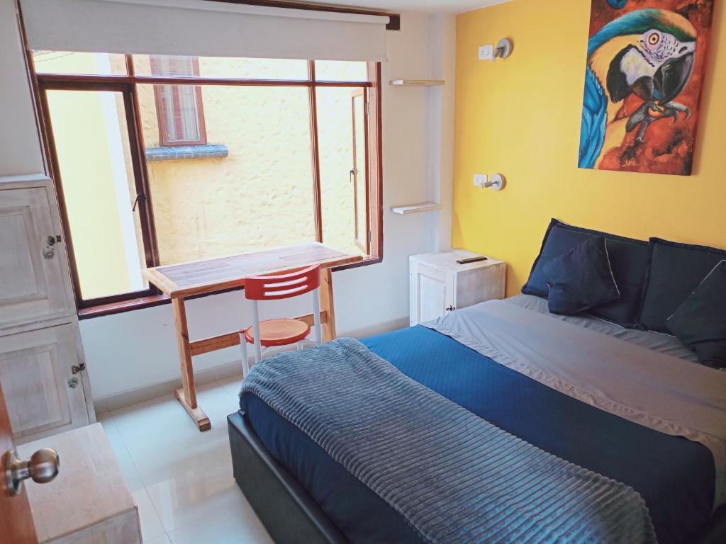 Postel nebo postele na pokoji v ubytování Usaquen Station Hostel