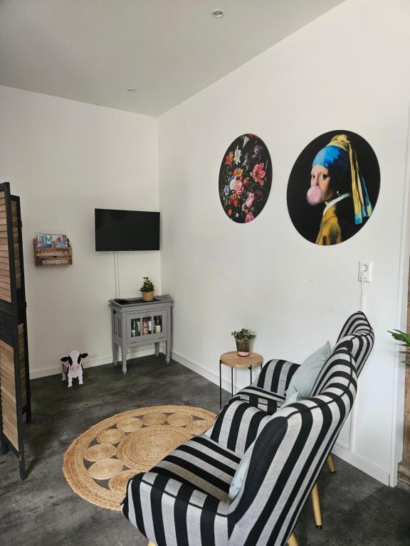 TV a/nebo společenská místnost v ubytování B&B Wijdzicht