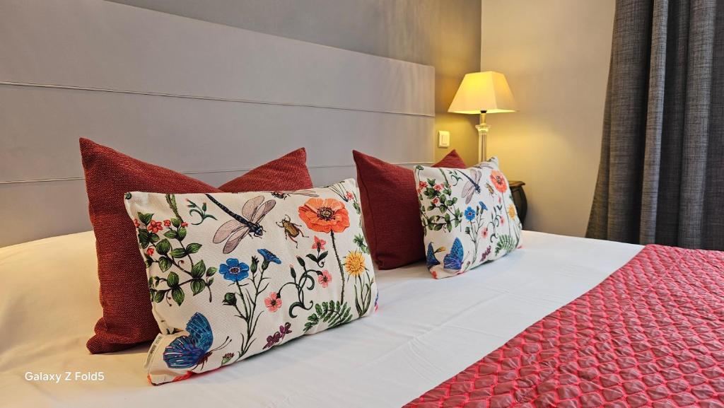 Postel nebo postele na pokoji v ubytování Brit Hotel Acacias