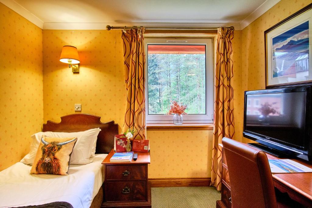 TV a/nebo společenská místnost v ubytování Muthu Ben Doran Hotel