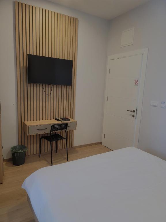 TV a/nebo společenská místnost v ubytování MD Apartmants