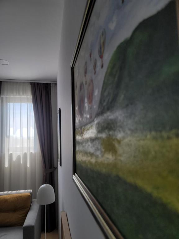 TV a/nebo společenská místnost v ubytování MD Apartmants