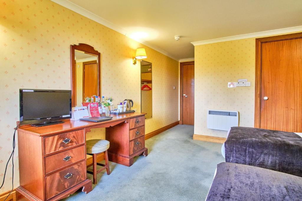 TV a/nebo společenská místnost v ubytování Muthu Ben Doran Hotel