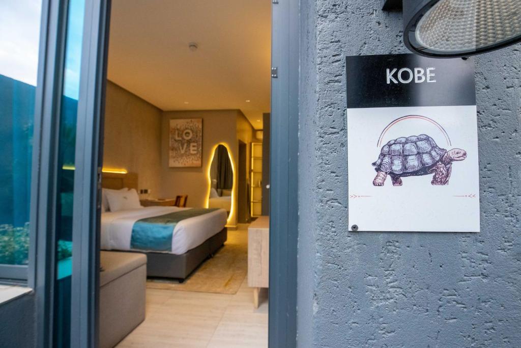 Postel nebo postele na pokoji v ubytování Gigiri Lion Villas II