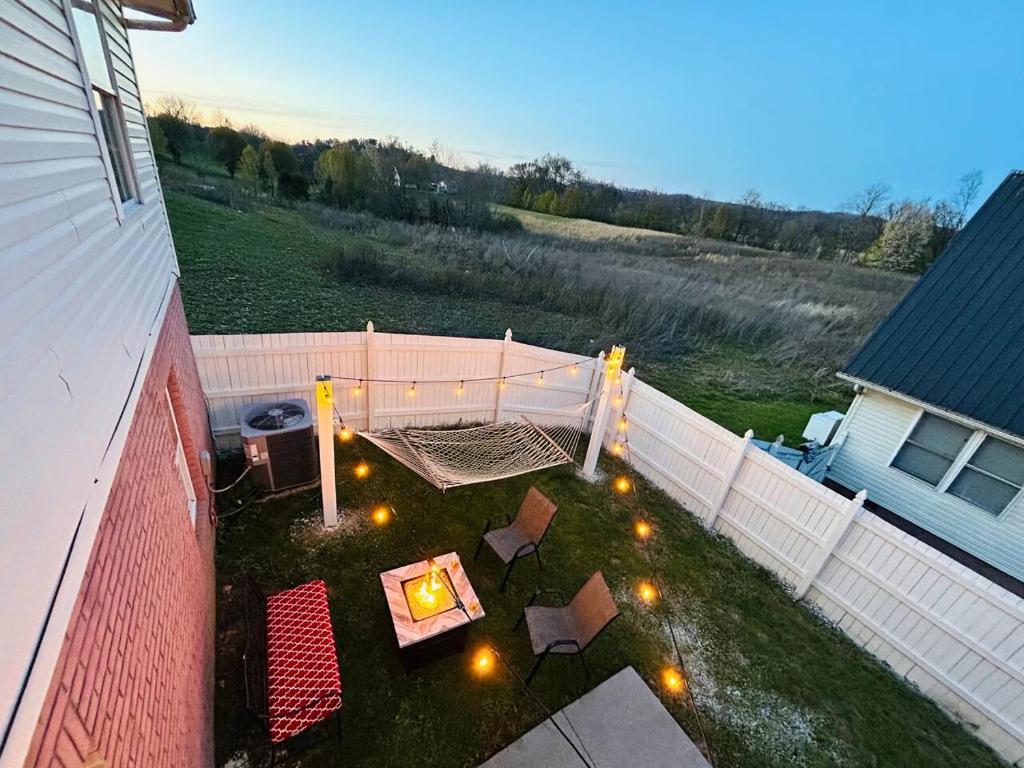an aerial view of a backyard with a table and chairs at The Great Escape King suite, Kid friendly in Sevierville