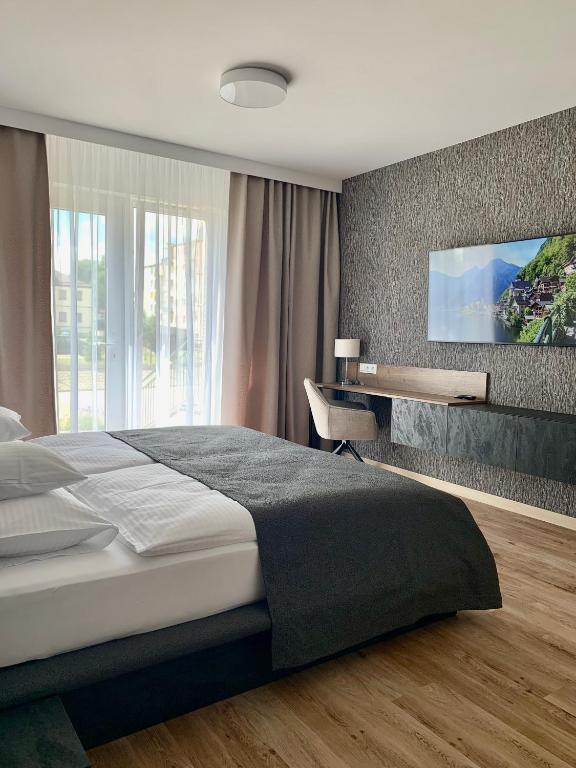Postel nebo postele na pokoji v ubytování REMAR - Apartamenty z widokiem na Jezioro Biale