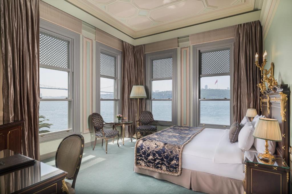 A bed or beds in a room at Bosphorus Palace Hotel