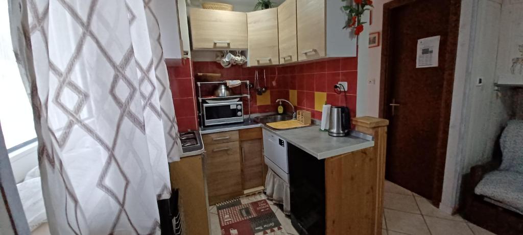 Kuchnia lub aneks kuchenny w obiekcie Le Casette
